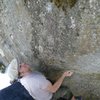 Todd Helgeson starting the crux on The Driven Snow V8/9, at the Frostbite Boulders, AK.