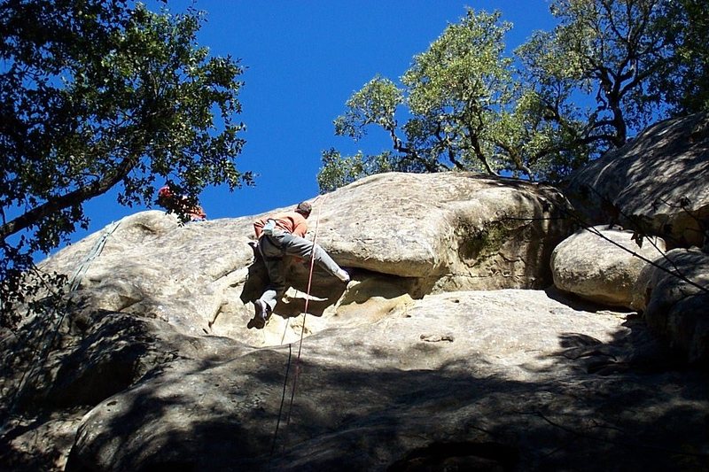 Paul doing the crux move thru the roof of Putrefaction.  November 2004