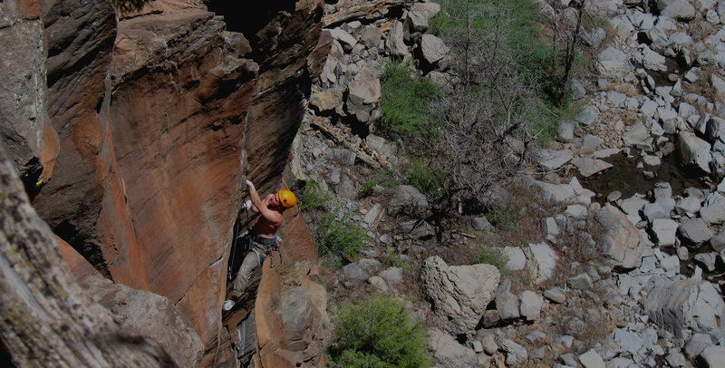 James Q Martin hiking the top of Goldfinger.