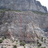 From across the canyon. Climber mid-first pitch.