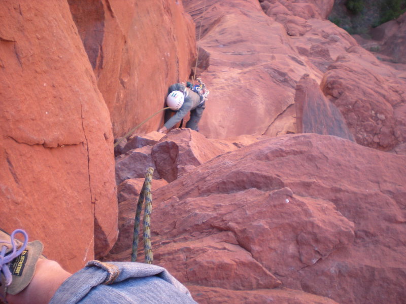 Dan Millis is beginning the climb's overhanging crux on P2.