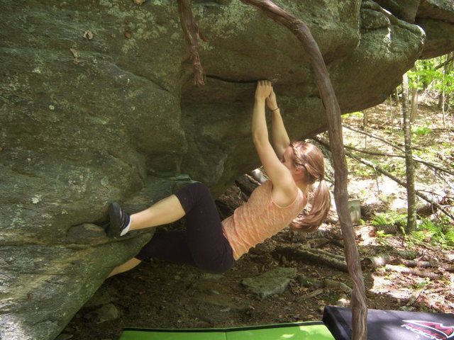 Joanna Jennings working through the second move of "Copperhead(V-3) on the contact boulder, the contact station, GHSP Virginia.