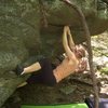 Joanna Jennings working through the second move of "Copperhead(V-3) on the contact boulder, the contact station, GHSP Virginia.