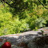 Looking down from the top of the second pitch.  Baldy on belay, Addario motoring up the face, well before the alcove.