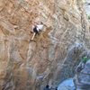 Joe on Jailbreak. Eric Ruljancich on belay. Photo by Jim Scott.