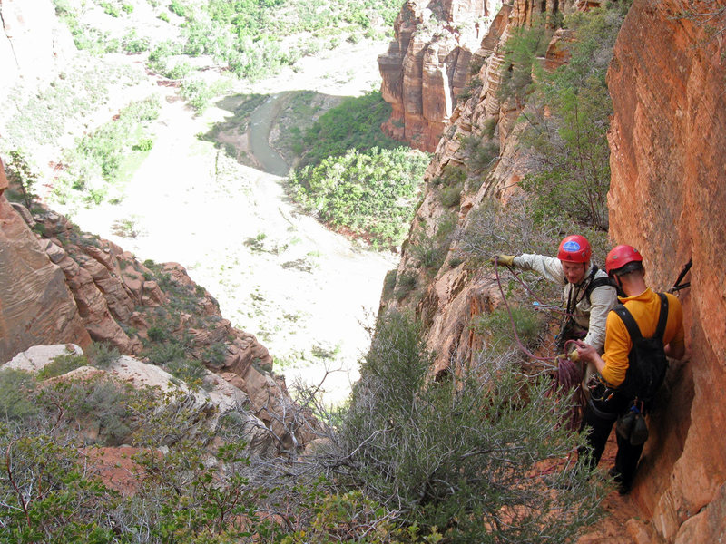 Lee Jensen and Perin Blanchard at the second rap station on the <em>Touchstone</em> descent.<br>
<br>
Photo by Marc Jensen.