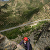 Nicole nears the top of Rational Expectations, more than 300 feet above Sespe Creek, in the Central Gully of the Fortress.