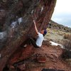 Jared LaVacque, setting up for the crux of Purity Control, V10, Matthew Winters Park, CO.