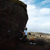 Jared LaVacque,past the crux on The Prow Problem, V6, Matthew Winters Park, CO