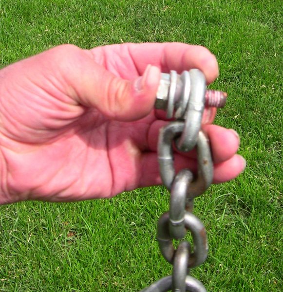 This was one of the anchor bolts!  When taking into account the washers and chain, there was not much of the stud threaded into the sleeve.
<br>

<br>
The anchor has been replaced courtesy of ASCA.