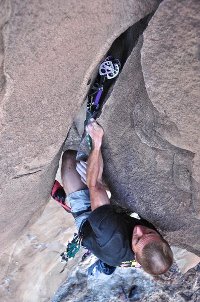 Laybacking through the wide crack crux. June 2010.