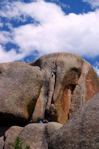 An unknown climber on Upper Slot.