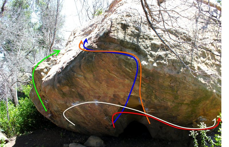 Beta photo showing some of the many lines on the Outlaw boulder:  I ain't broke, but I'm badly bent (green, V3), Dancing Outlaw (blue, V8), Double Super-Buzz (Orange, V8), Akiba's Prison (Red, V8), Zombie Armageddon (White, V10?)