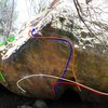 Beta photo showing some of the many lines on the Outlaw boulder:  I ain't broke, but I'm badly bent (green, V3), Dancing Outlaw (blue, V8), Double Super-Buzz (Orange, V8), Akiba's Prison (Red, V8), Zombie Armageddon (White, V10?)