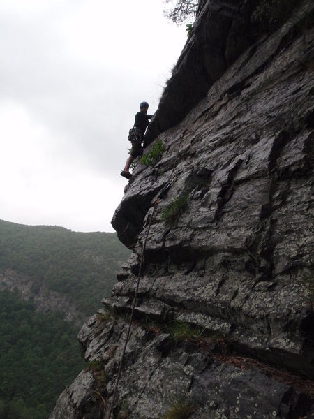 Ryan leading the top of Triumvirate in the rain.  Belayed in the corner, but an easier belay is closer to the start of the traverse.