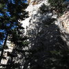 The light in this photo is pretty bad, but the photo should help you find the climb. Big Medicine climbs the right side of this formation starting in grey, slabby rock. Pale Face Magic is on this same formation, but around the corner to the left.