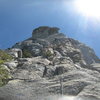 Agina Sedler on pitch one with climbers heading to The Edge above her.