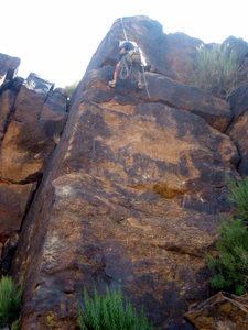 Marc Hansen cleaning and bolting Clay Pigeons (5.10a).