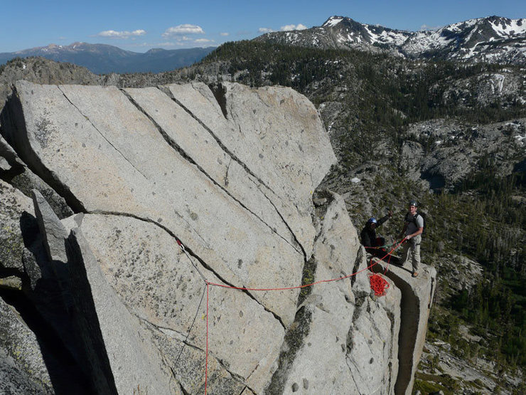 Donny and Natalie at a block in the air.  Excellent belay spot. The photo was taken after the traverse on Pitch 4.