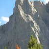 The first 5 pitches ascend the smaller tower on the left side, eventually gaining its summit. Pitch 6 leaves the small tower and climbs a straight sweet splitter system up to a slabby belay. Pitch 7 gains the summit.