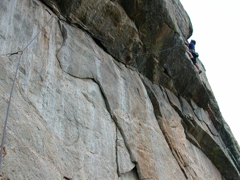 Belcer above the crux roof. June 14, 2003.