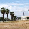 Lonely dirt lot on Main Street, downtown Riverside