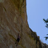 Upper tough section with a long undercling reach.  My span is 5'6" and I had rough go at it but it gets better by using terrible feet and a little momentum.