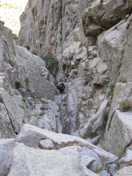 Looking down from the top of the first chock-stone.  James coming up.  Easy climbing on the left (looking down), but hard to protect, protectable but harder on the right (looking down).