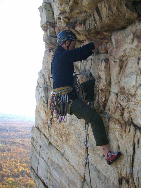 End of the vertical crack, ready to start the pumpy traverse on Le Teton. Photo by Mark Schambra