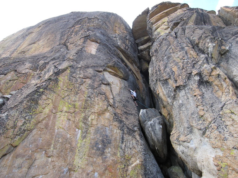 T. Chrudinsky climbs a 110 foot 5.10b on the right side of Electric Eagle Dome. Technical crux to endless vertical jugs. Another 5.10a (120 feet) that uses mixed bolts and gear is on the pillar to the right; the route goes up the center of the pillar climbing chicken heads, then a very nice crack before finally pulling the double roof at the top.  