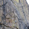 S. Giffin climbs through fantastic dishes and edges on an 11c on High Eagle Dome.