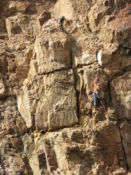 Kim Hall leading this climb on trad gear.  Route has two sections of hands and a body length of finger (pictured) 