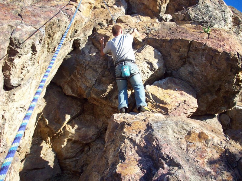 Alex Climbing the route 