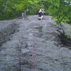 Jeff Lea contemplates the crux finish on AP Treat, Cathedral Ledge, North Conway. Phot by Chad Hussey