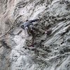 Humboldt Current (5.10a) with first bolt clipped. August of 2010, very sandy holds, had to be swept repeatedly for decent grip. All the lead bolts are showing corrosion, but anchors are nice s/s glue-ins.