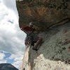 J. Seaver starting the crux pitch 3.<br>
<br>
Photo by John Tormalehto.