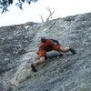 Mid crux on the first ascent of Tiger's Eye, 5.10c