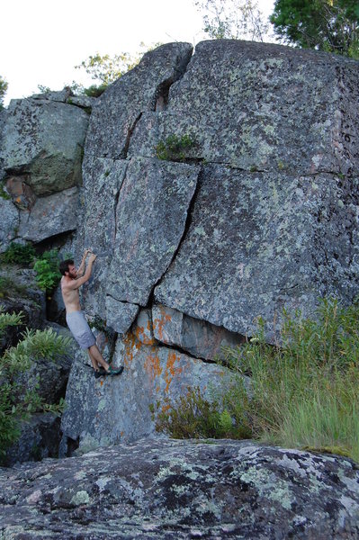 Project Boulder on the back of little Presque.  15 foot tall big fists to off width crack line and a huggy arete line.  Super flat landing.  Go get it!