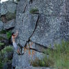 Project Boulder on the back of little Presque.  15 foot tall big fists to off width crack line and a huggy arete line.  Super flat landing.  Go get it!