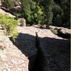 Looking down the crack of pitch 2. I managed to avoid the PI with a couple face moves right.  The only way to keep your rope out of it is to keep it in your pack.