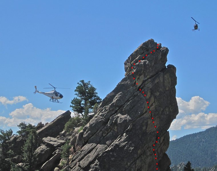 Search & rescue (?) doing some hover training around the Jamcrack Spire.  The left crack is shown by the red dotted line.  Easy downclimb (with one very exposed move) is possible from where the route breaks to the summit down to the tree.  It's a scramble down from there.