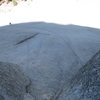 Looking down from the second belay at face climbing on the apron.