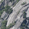 Extreme telephoto of 2  unknown climbers at rappel tree, from 3 miles.