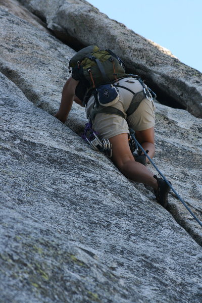 Agina into the fun crack climbing of pitch two.