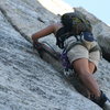 Agina into the fun crack climbing of pitch two.