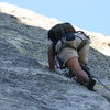 Agina into the fun crack climbing of pitch two.