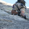 Agina into the fun crack climbing of pitch two.