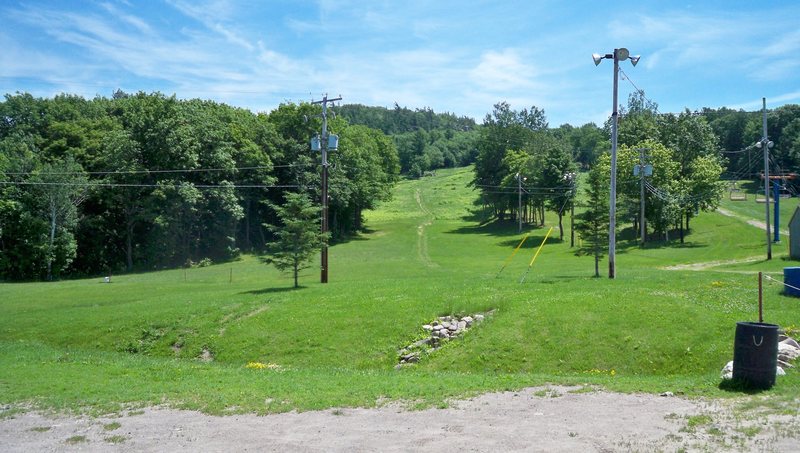 Parking area at base of Rigaud, cliff face is up on the left, follow the hiking trail in the far left ski run. The trail uphill is also used by hikers and dog walkers.