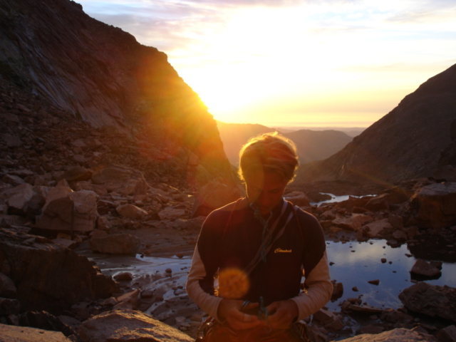 Chris Harkness racking up on Mills Glacier.  Photo by Chris Dulen