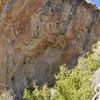 You can see the bolts on the route on this overhanging face of Bl'iever Boulder